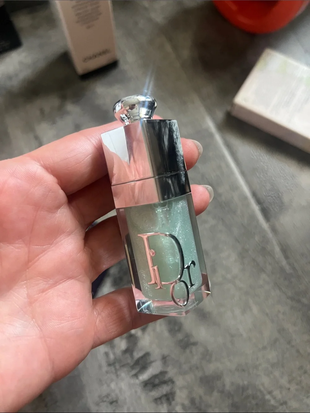 Dior Addict Lip Glow Oil in Mint Green with Silver Cap